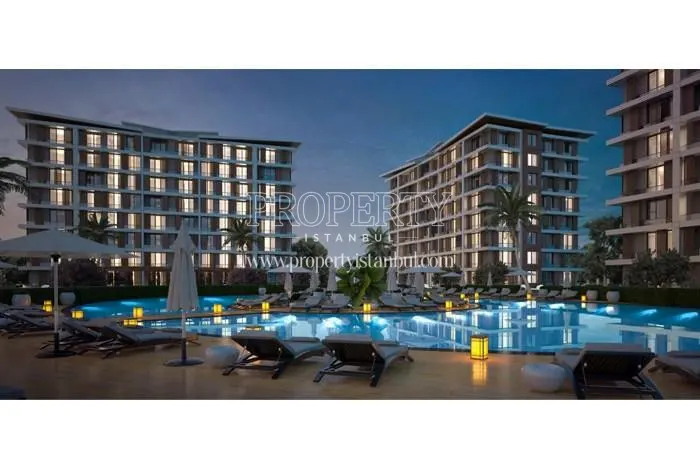 Outdoor swimming pool in AKS Focus at night