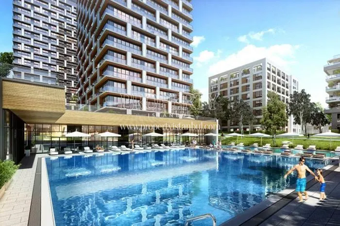 The outdoor swimming pool of AND Pastel compound
