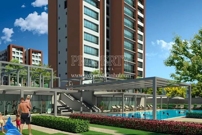 Adanus Park residents swimming in the compound pool