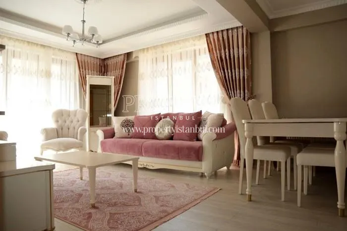 Pink lounge suite in one of the apartments in Adatepe Teras