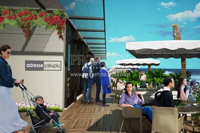 Adresse Yakuplu residents hanging out in the compound cafe