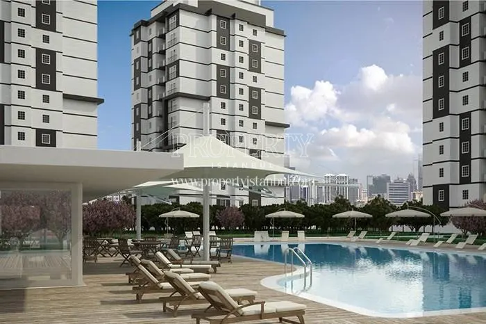 The outdoor swimming pool amongst the blocks of Akkent Doga Konutlari 2. Etap