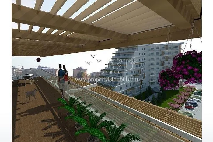 The couple viewing the sea from their balcony in Alteras