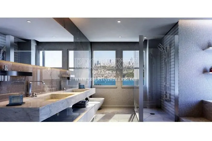 The wide luxury bathroom with a sea view in Antteras