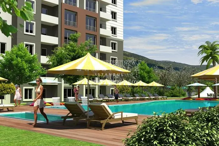 The outdoor swimming pool of Apricot Garden Evleri