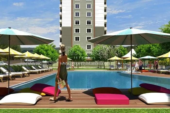 The outdoor swimming pool of Apricot Garden Evleri