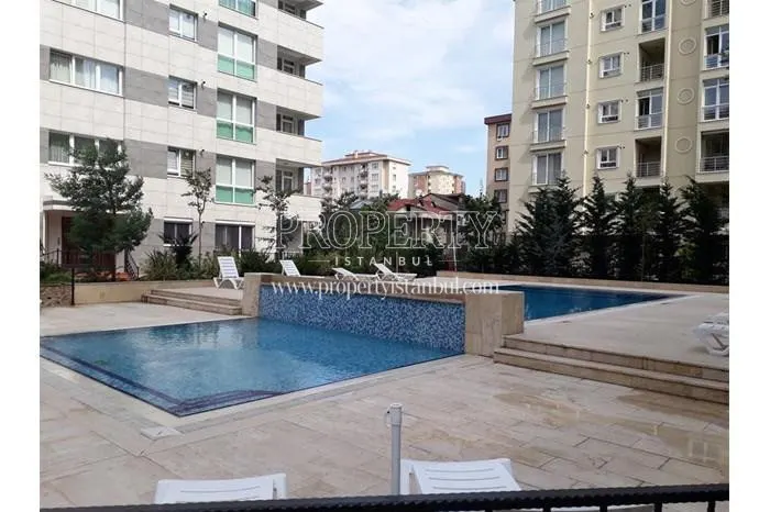 Outdoor swimming pool in Aram Deluxe