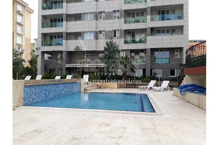 Outdoor swimming pool in Aram Deluxe complex