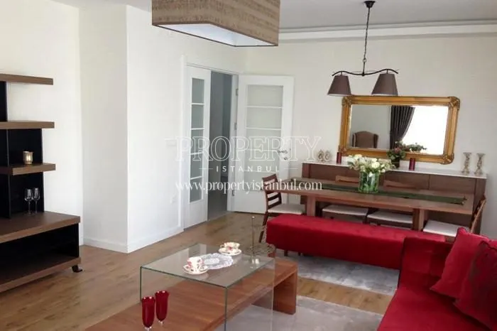 Red lounge suite in Arifoglu Residence