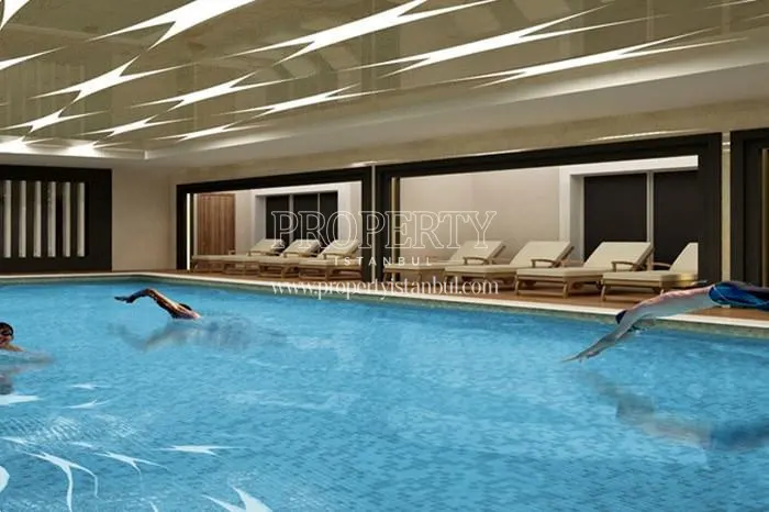 Aris Grand Tower residents swimming in the indoor swimming pool