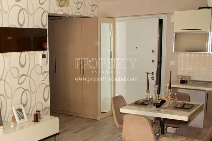 The inside of the apartment whose door is open in Aris Park Residence
