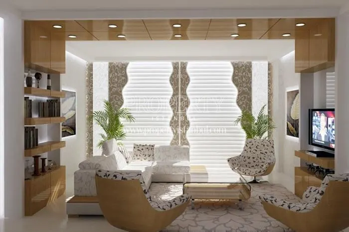 Flower patterned white and brown sofas in one of the living rooms in Arma Cadde