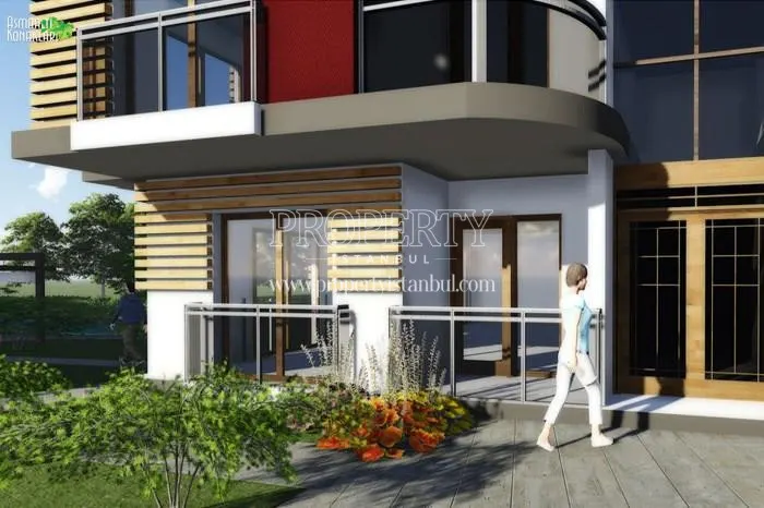 The woman going into one of the buildings in the Asmaalti Konaklari project