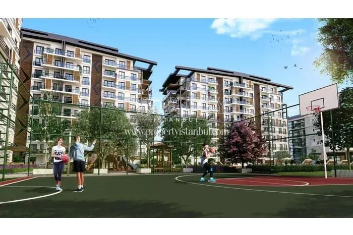 Children playing basketball in the Atlantik Life compound