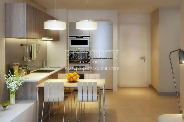 Small white kitchen in one of the Avrupa Residence & Office Atakoy apartments