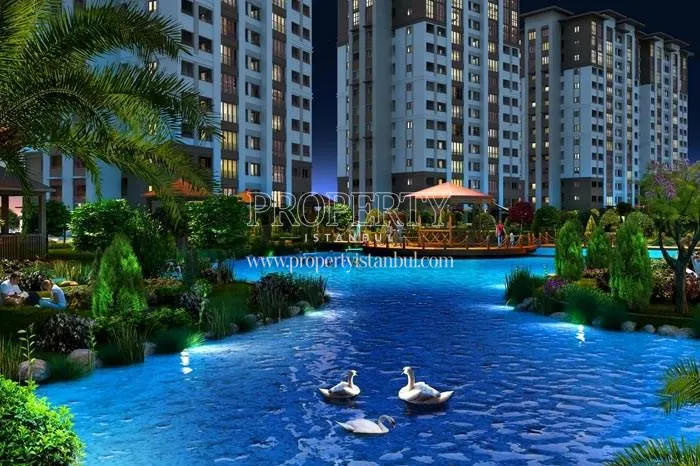 Artificial lake in the Avrupark Bahcekent compound at night