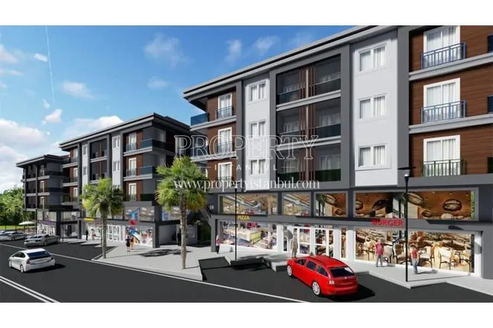 The shopping center under the residential buildings in Ayazma Plus