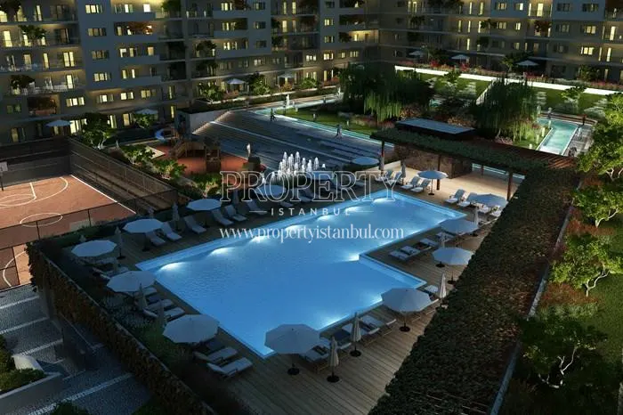The outdoor swimming pool of Aydos Land at night