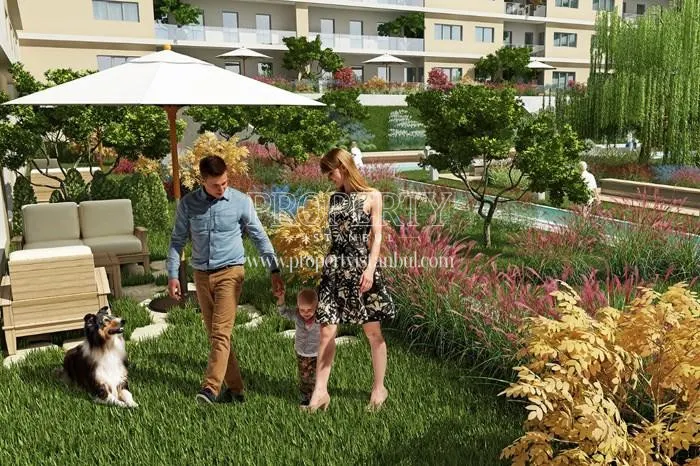 The family enjoying themselves in the garden of Aydos Land compound