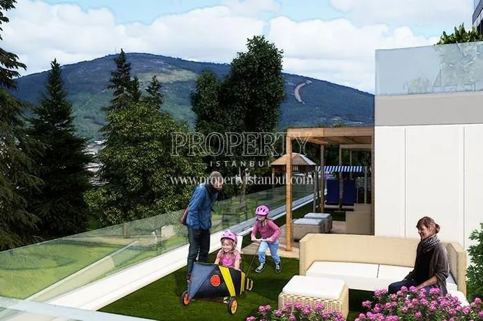 The family enjoying themselves in Aydos Yasam compound's garden