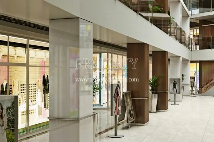 The inside of the shopping center in Aykutoglu Flats