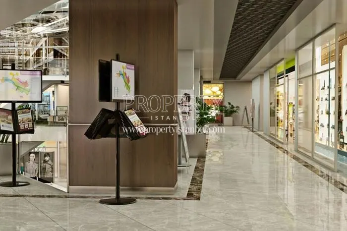 The inside of the shopping center in Aykutoglu Flats
