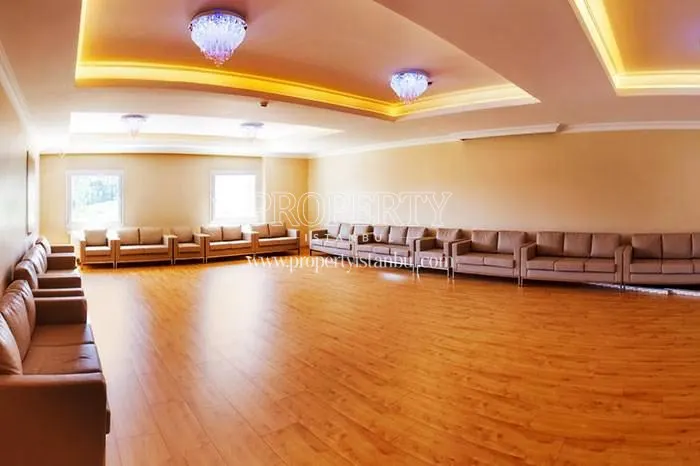 The room full of sofas in Azizistan