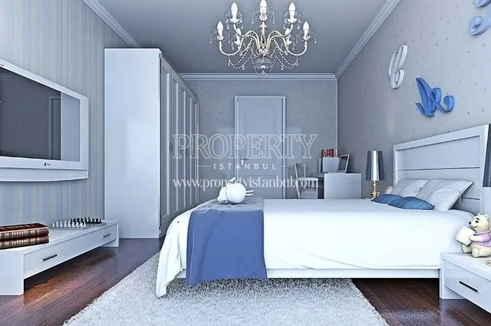 The master bedroom furnished with white furniture in Babacan Palace