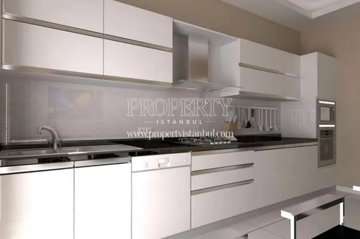 The white kitchen in one of Bahce City's homes