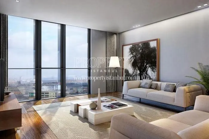 The living room with a cream-colored lounge suite in Balance Gunesli