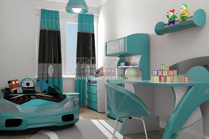 Blue and white furnished boy’s bedroom in BanuEvleri Ispartakule