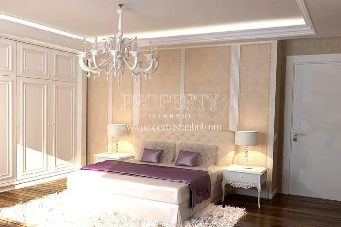 Spacious white master bedroom in Basak Palace