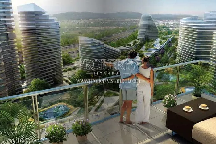 The couple viewing Batisehir compound from their balcony