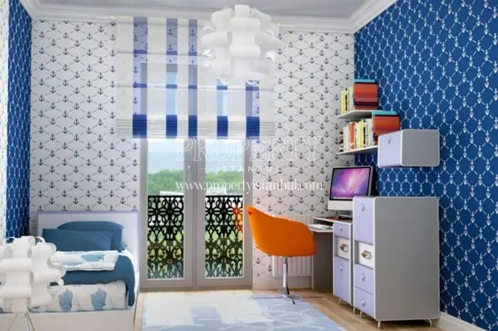 The small bedroom with blue and white walls in Beyce Konaklari
