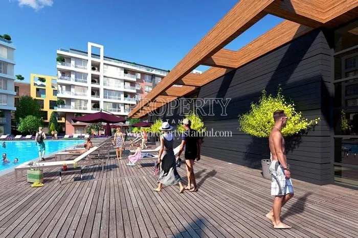 The residents enjoying the swimming pool in the Boutique Daca compound