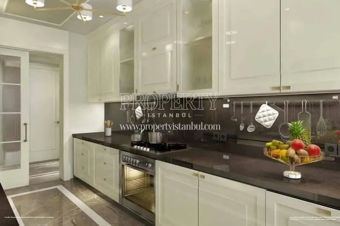 The kitchen with white kitchen cabinets in Buyukyali Istanbul