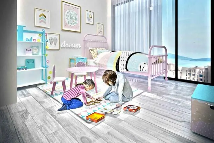 Two girls playing in their bedroom in CT 45 Residence