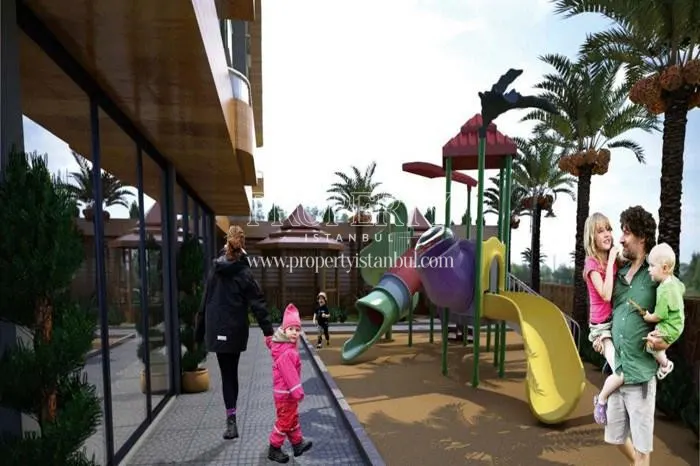 The children playing in the playground with their family in Cadde Varlik Residence compound