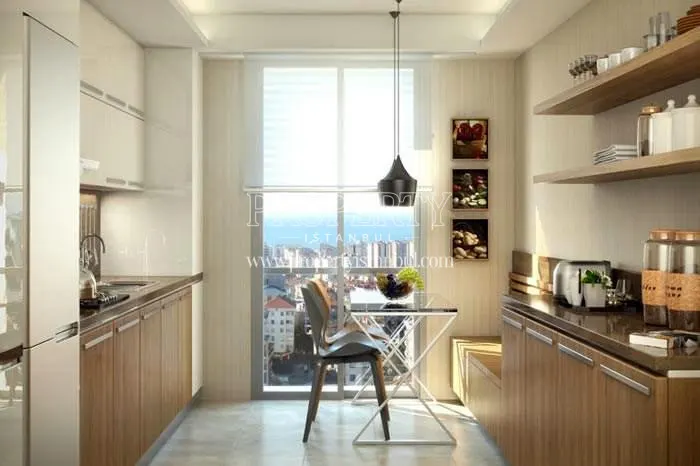 The kitchen with a sea view in Cebeci Residence