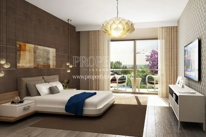 Bedroom with the balcony in Cemtas Kavakli Villalari