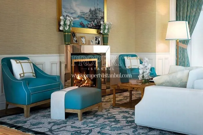 The living room with a fireplace in Ciftci Towers