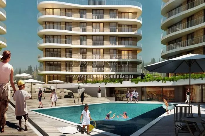City Ambiance residents swimming in the compound pool