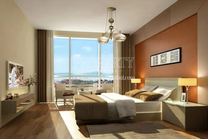 The master bedroom with the sea view in Cukurova Balkon homes