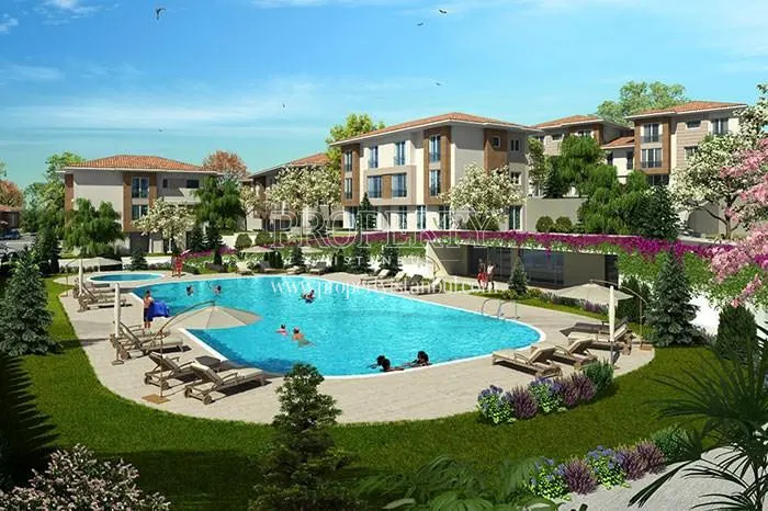 Dekar Asmali Bahceler residents swimming in the compound pool