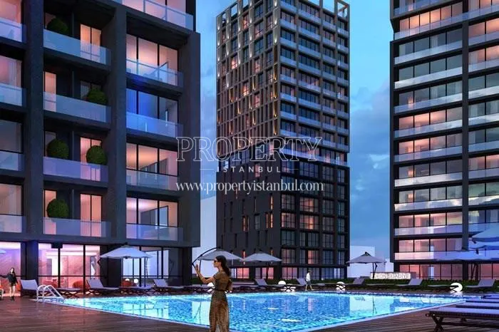 The outdoor swimming pool amongst the Dekon Suadiye Ametist blocks