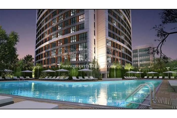 The outdoor swimming pool of the Deluxia Park Residence compound