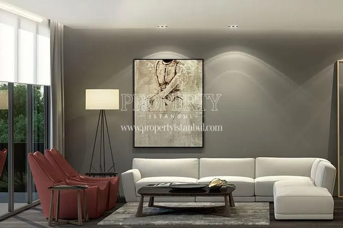 The living room with a white corner sofa in Demir La Vida