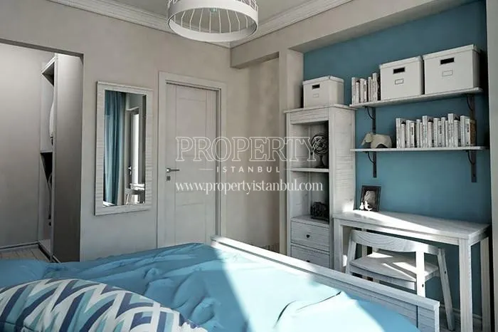 White and blue bedroom in Double Flats