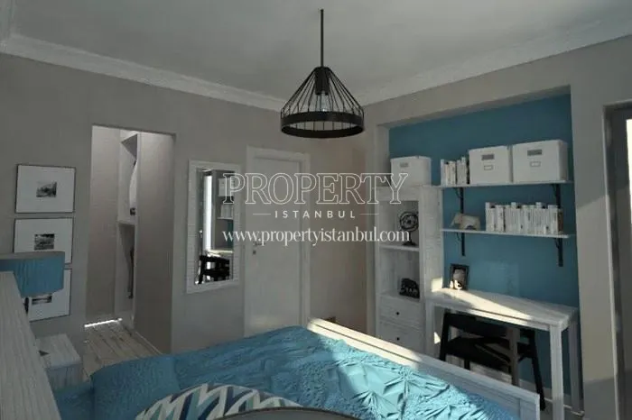 White and light blue bedroom in Double Flats
