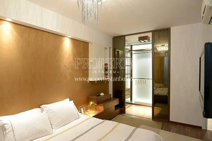The master bedroom with a dressing room in Dumankaya Konsept Halkali